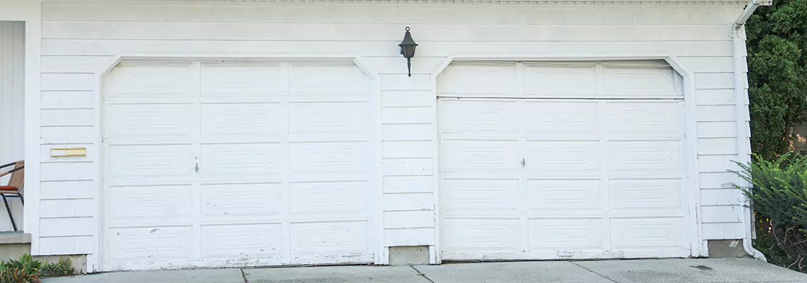 Roller Garage Door Dropped Down Replacement in Schaumburg, IL